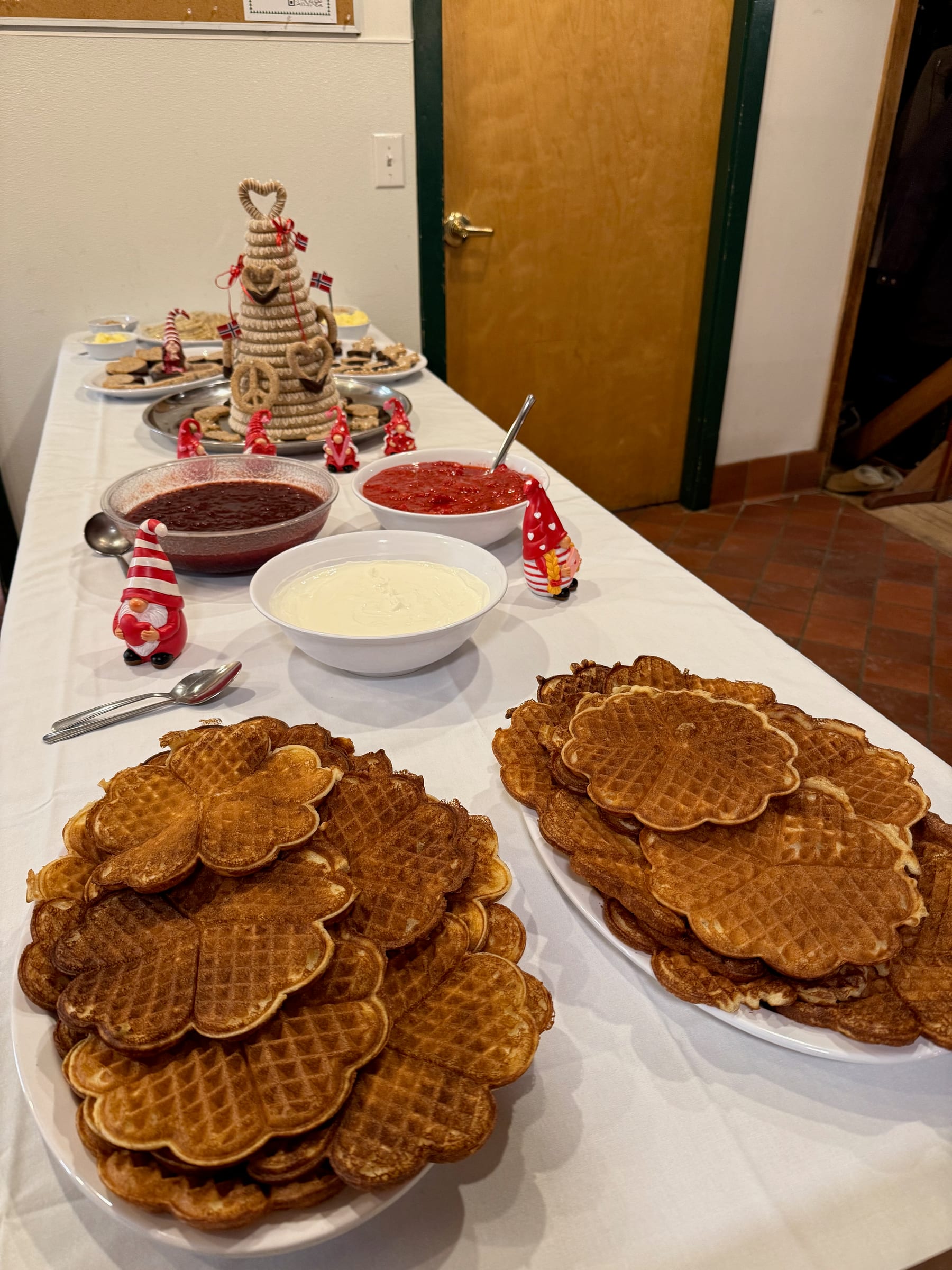 Saturday snack including waffles, jams, kransekake and more.