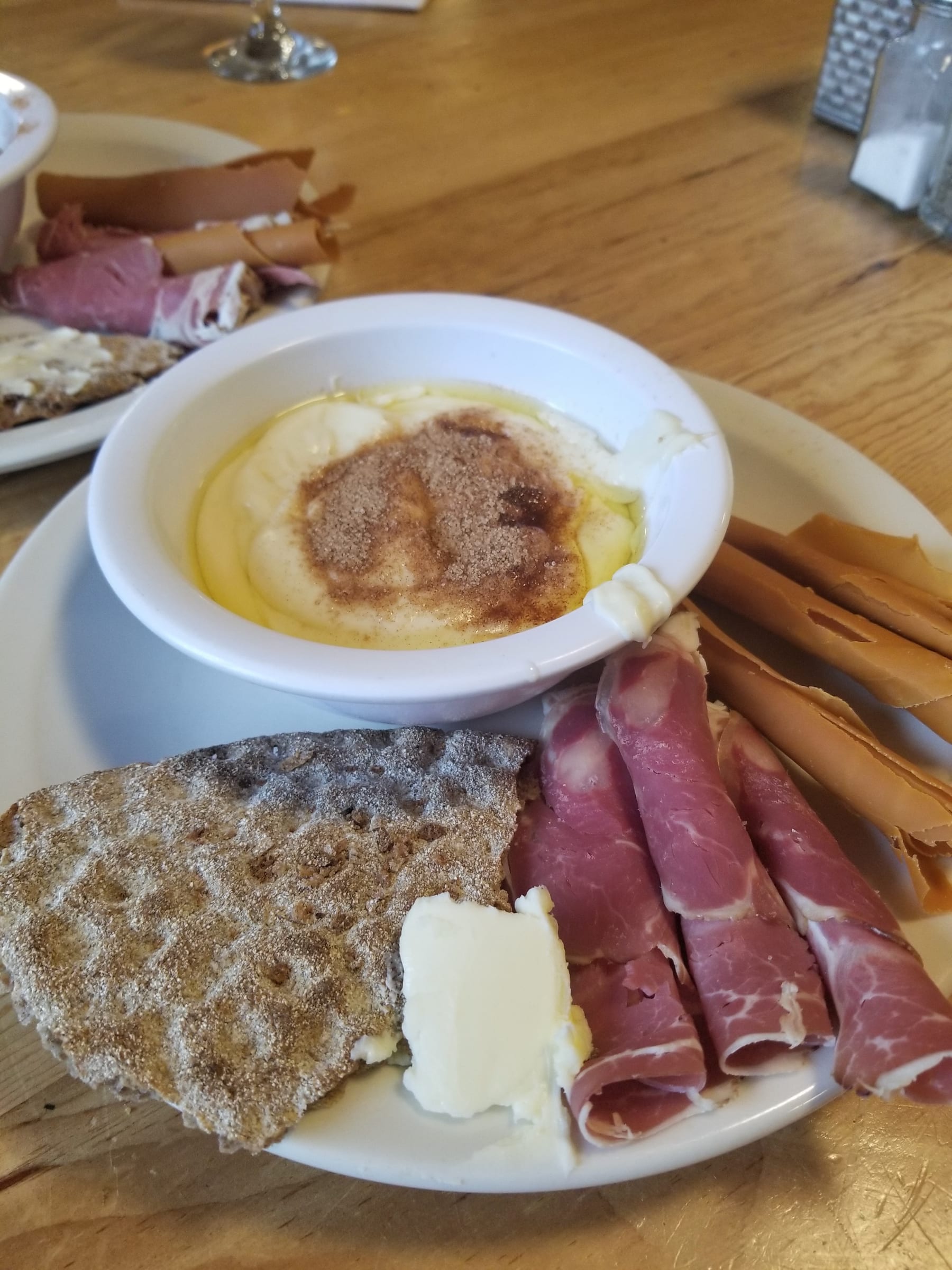 Traditional Saturday lunch with rømmegrøt, knaek with brunost and fenalår